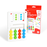 Edx Education Busy Play sensory sliding puzzle showing hands solving a tactile logic game with activity cards for developing fine motor skills and problem-solving-2