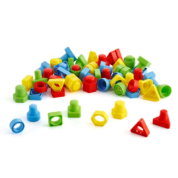 A pile of colorful plastic nuts and bolts in assorted shapes and colors, including red, blue, green, and yellow triangles, squares, circles, and hexagons. Designed for children to twist and match for shape and motor skill development.