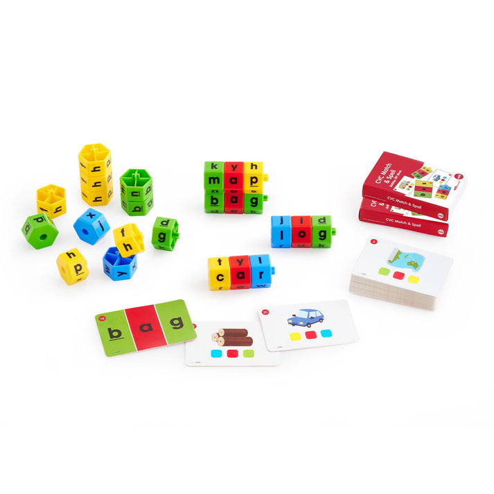CVC Match and Spell literacy kit including color-coded rotating letter blocks, CVC word cards with pictures, and instructional booklets. Designed to support phonics and early reading skills.