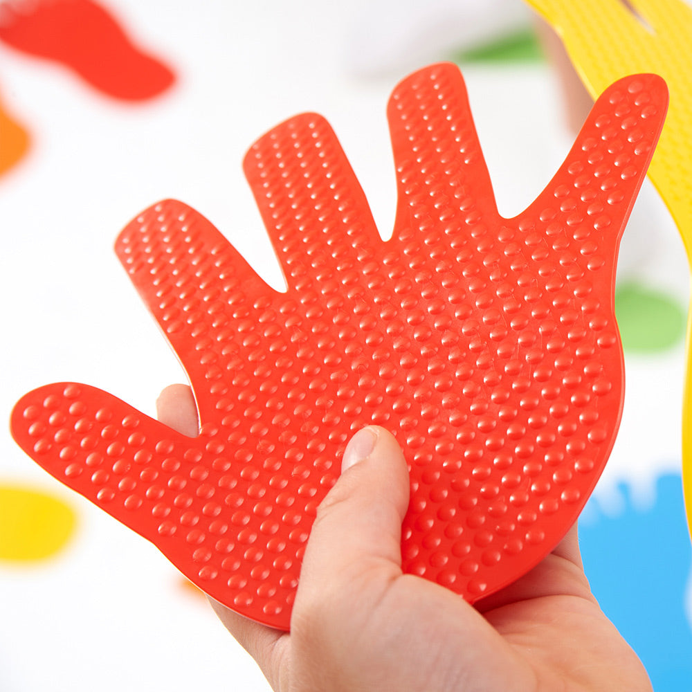 Child stepping on colourful Hand Marks – coordination and balance activity for EYFS | edx education® UK